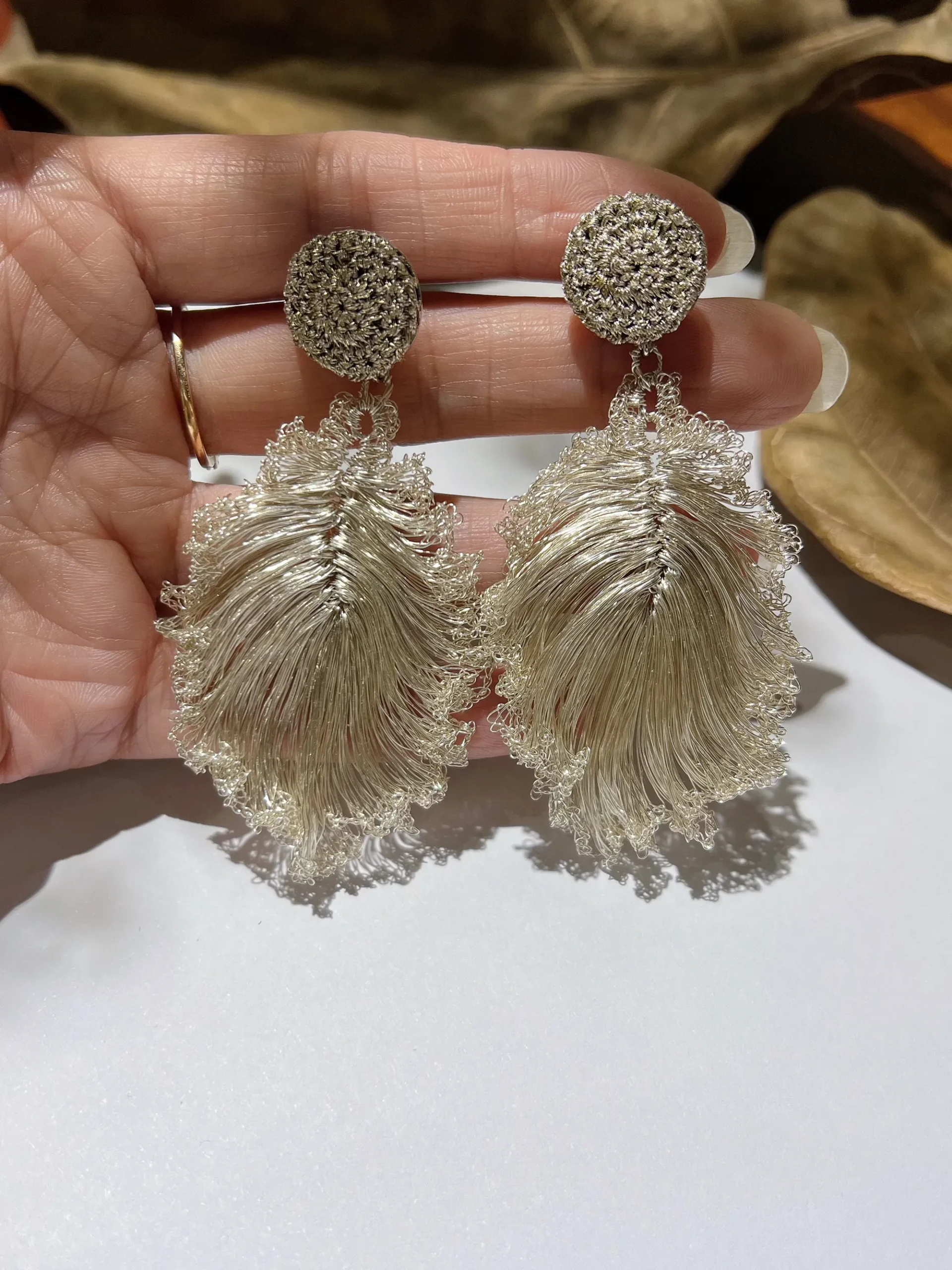 Pair of handmade silver-tone wire leaf statement earrings