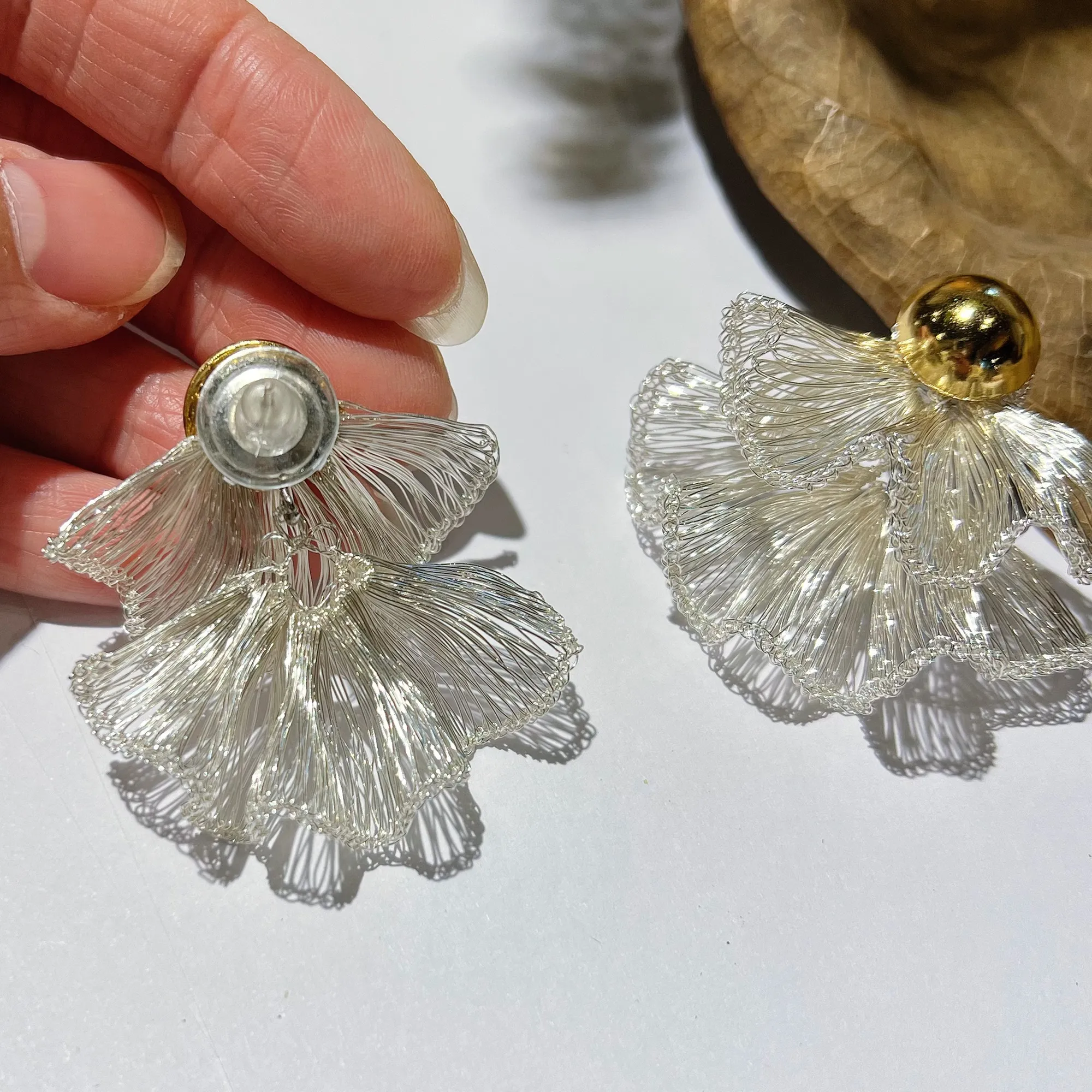 Layered wire fan earrings back detail showing hand-finished structure