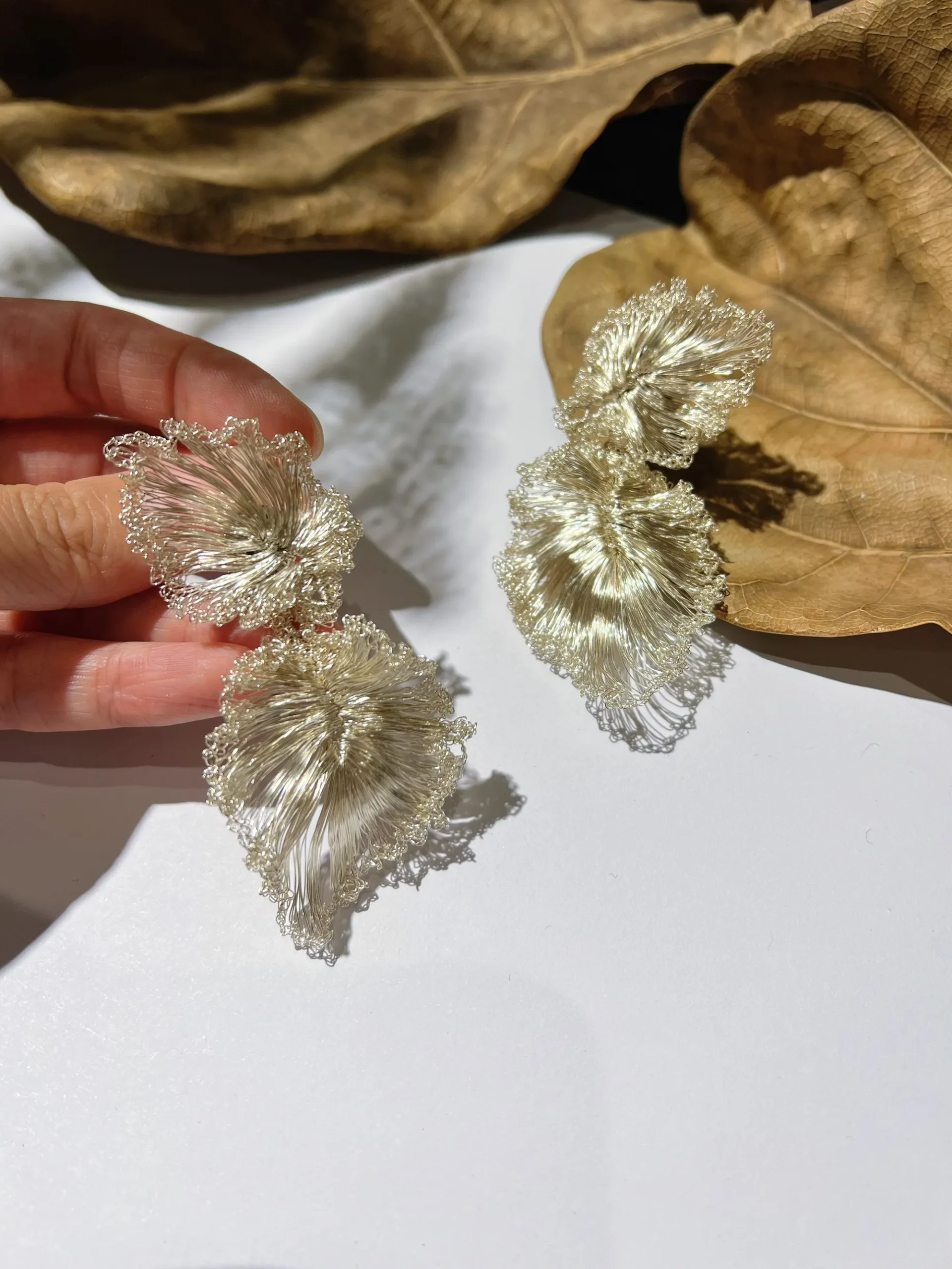 Pair of silver-tone ginkgo leaf drop earrings