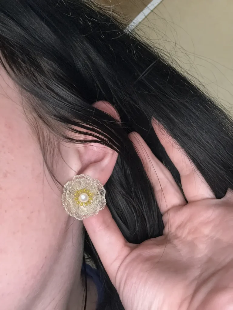 OREYNE Botanical White Poppy Jewelry worn on model