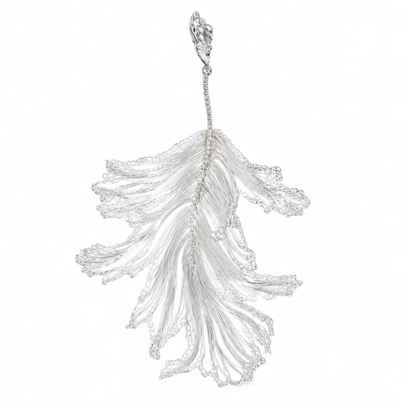 OREYNE Skeleton Leaf handwoven silver-tone drop earrings on white background