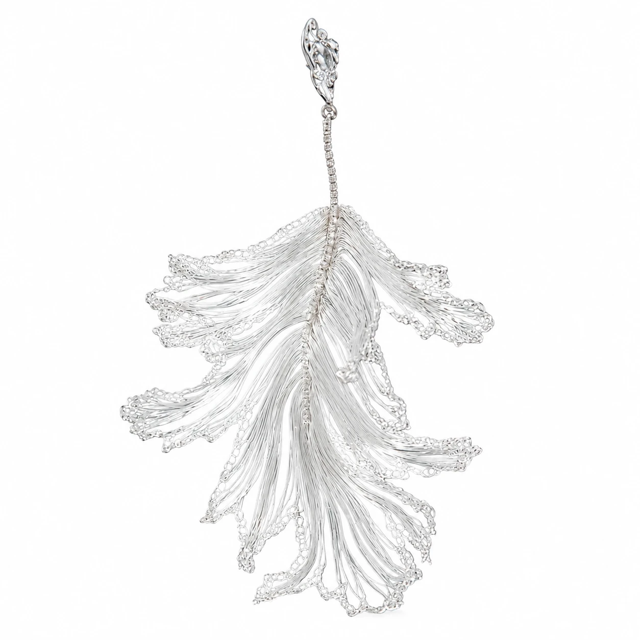 Close-up detail of OREYNE Skeleton Leaf sculptural drop earrings
