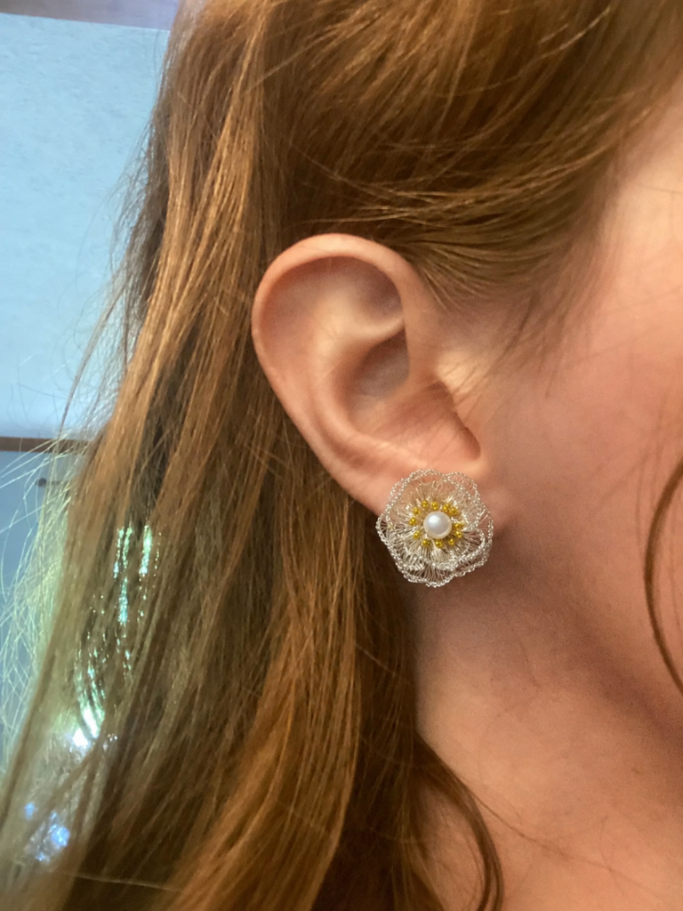 OREYNE Botanical White Poppy Jewelry worn on model