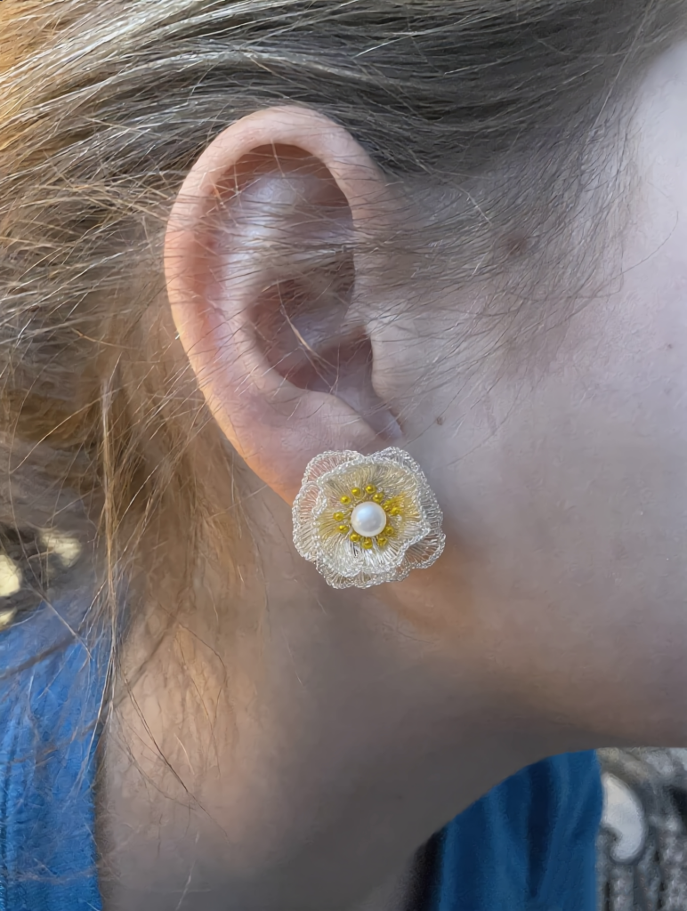 OREYNE Botanical White Poppy Jewelry worn on model