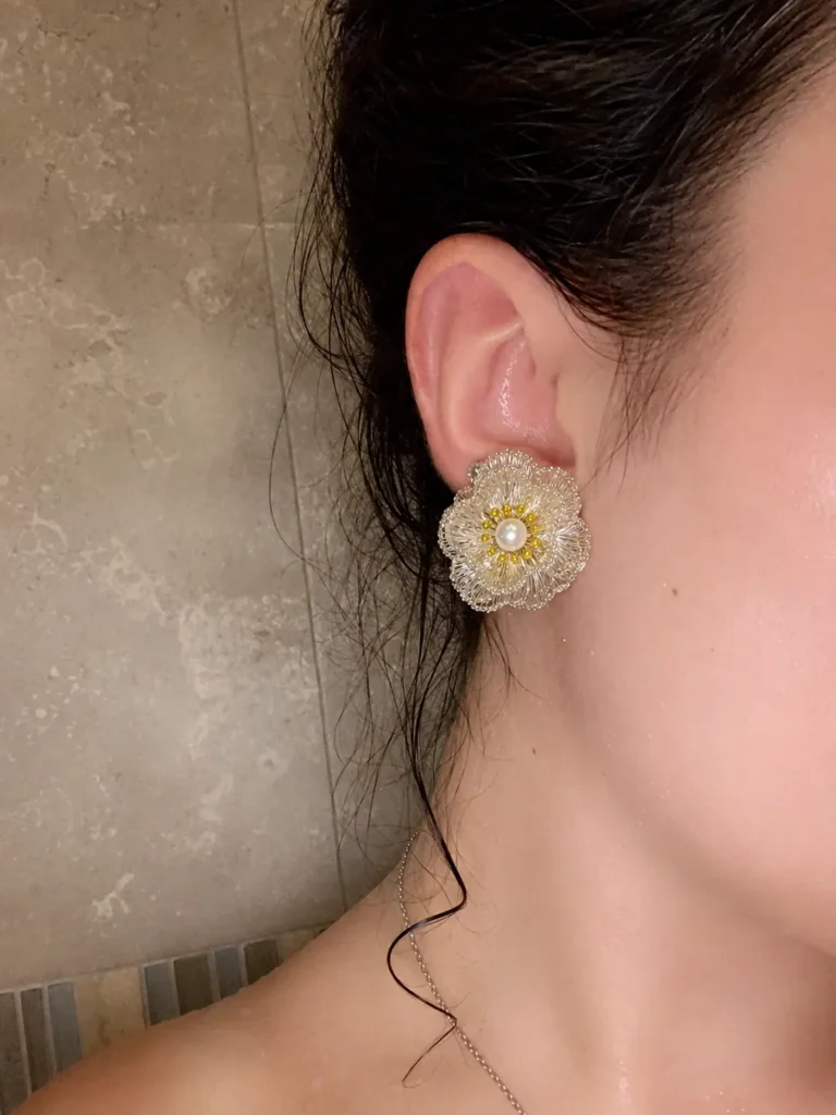 OREYNE Botanical White Poppy Jewelry worn on model