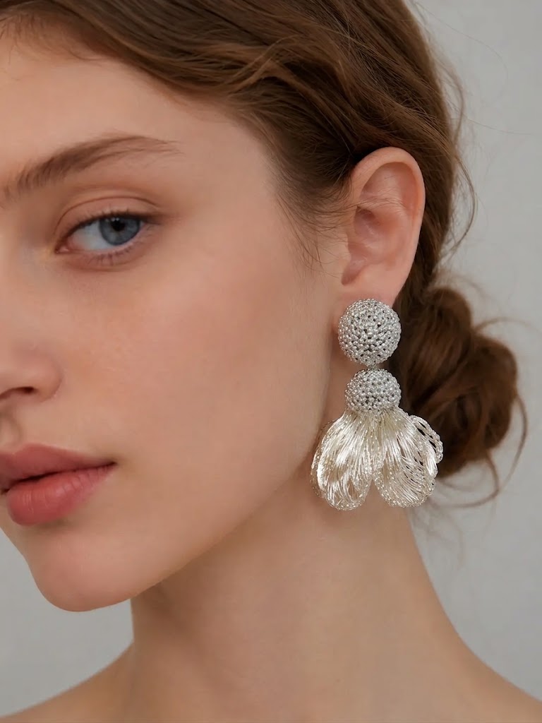 OREYNE Botanical Swan Clematis Earrings – close-up detail