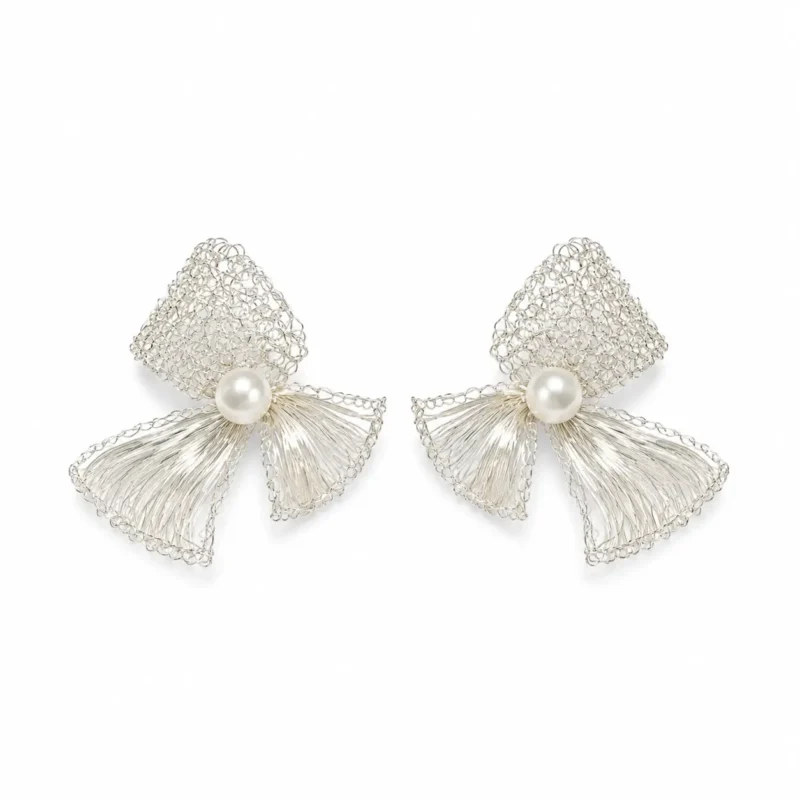 OREYNE handcrafted silver wire sculptural earrings with pearl centers on a white background