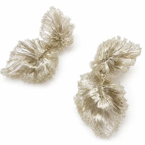 OREYNE handcrafted silver wire sculptural leaf earrings on a white background