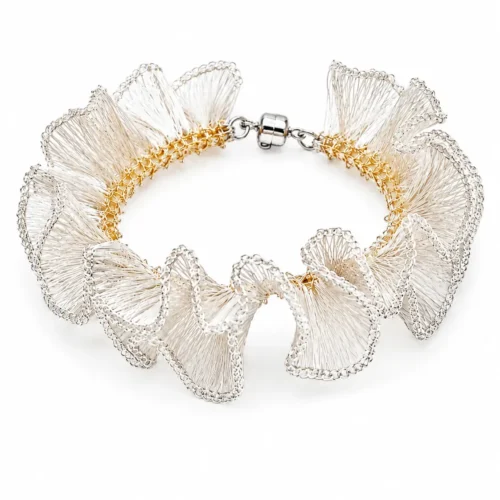 OREYNE handmade silver wire sculptural bracelet with gold-toned woven details
