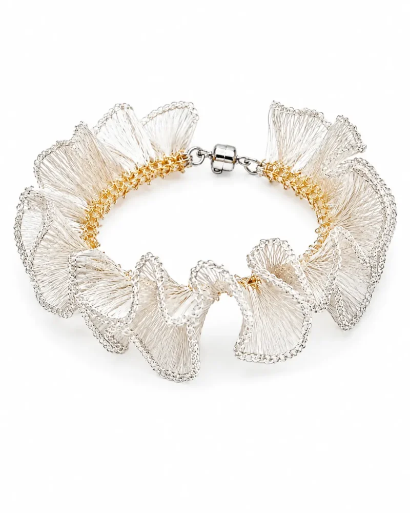 OREYNE handmade silver wire sculptural bracelet with gold-toned woven details