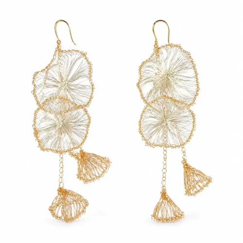 OREYNE handwoven gold-tone petal tassel earrings flat lay
