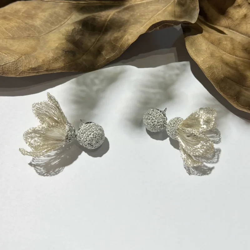 OREYNE Botanical Swan Clematis Earrings – close-up detail