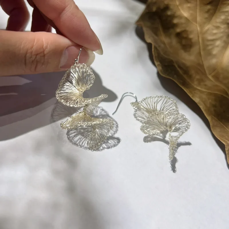 OREYNE Art Spiral Glass Sculpture Earrings – close-up detail