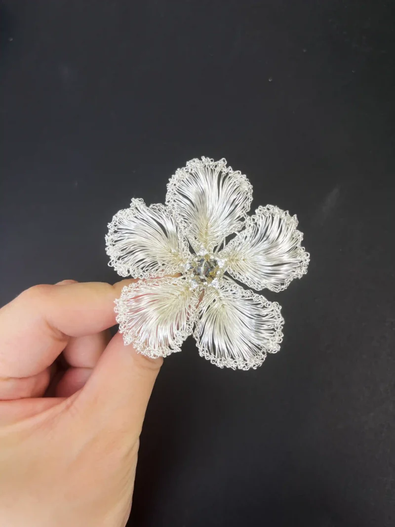 Handheld OREYNE White Blossom sculptural brooch