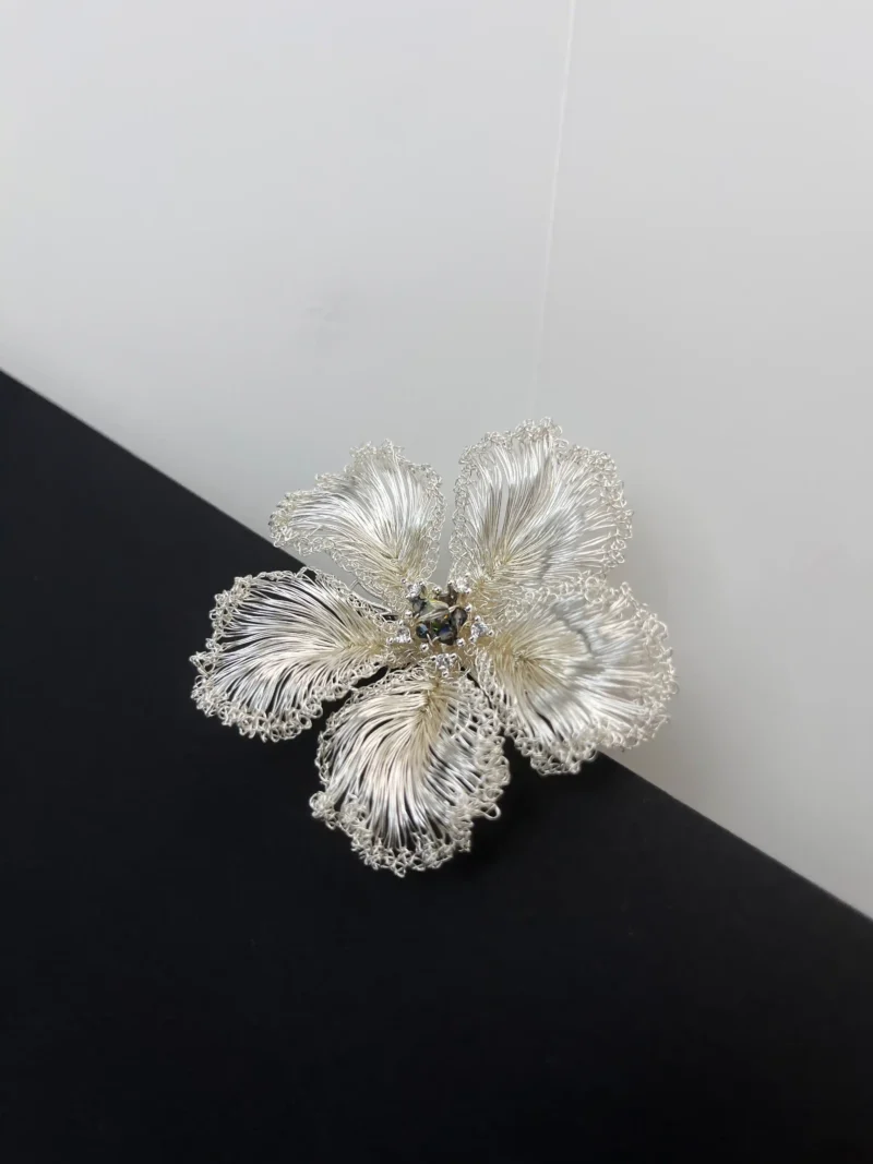 OREYNE White Blossom five-petal brooch detail