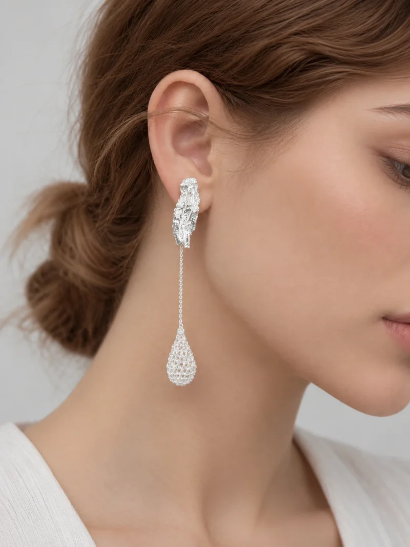 Side view of model wearing OREYNE Dewdrop Bud earrings