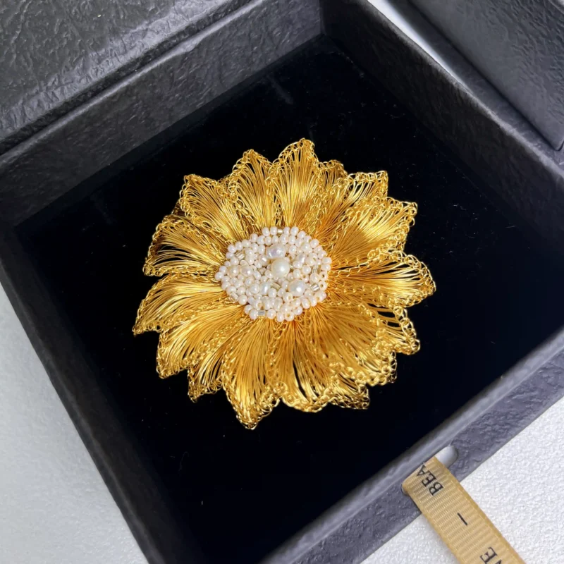 Gold-tone White Chrysanthemum brooch detail