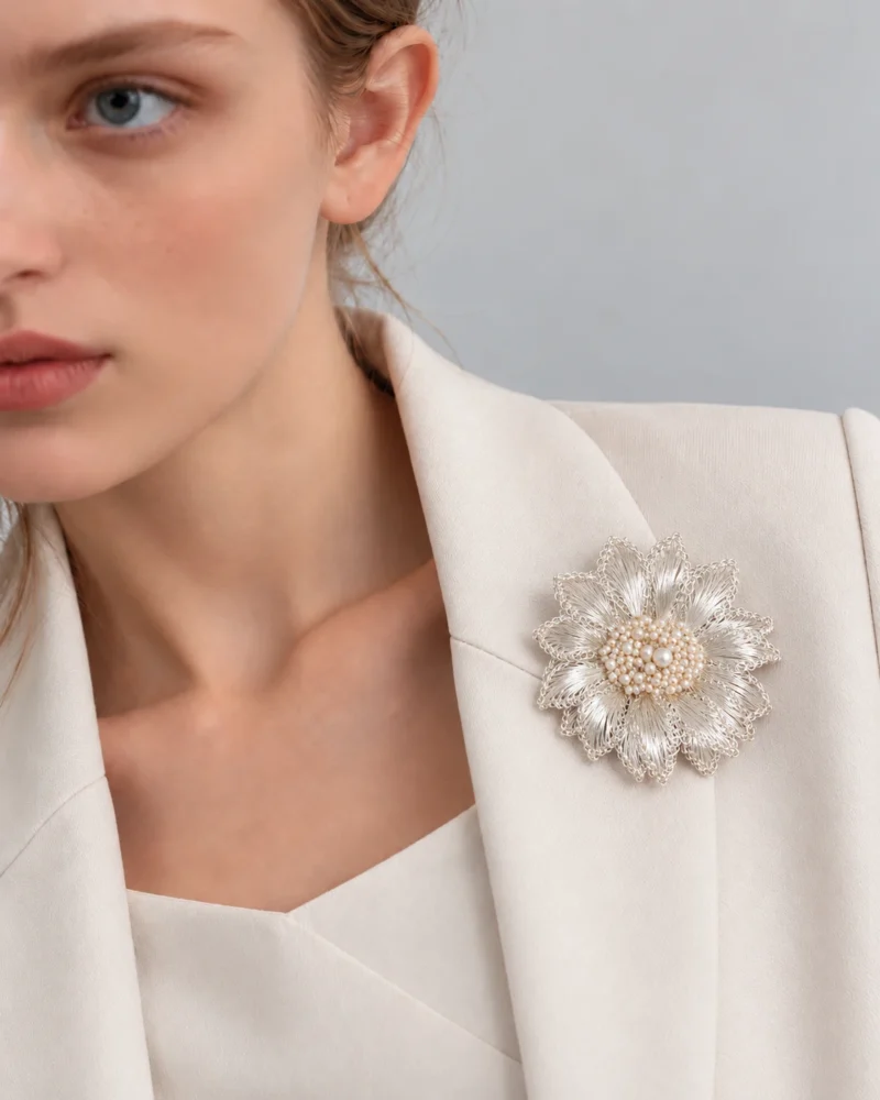 Model wearing White Chrysanthemum Luminous Heart Brooch